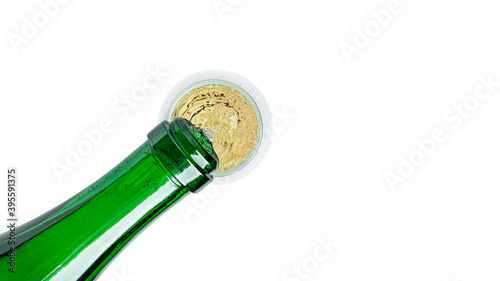Champagne pouring into a glass on a white background. High quality photo