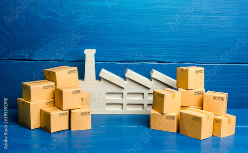 Принти на полотні A figurine of a plant and a lot of boxes