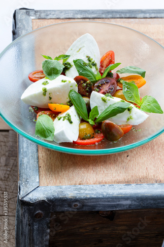 Tomato�s variations with mozzarella photo