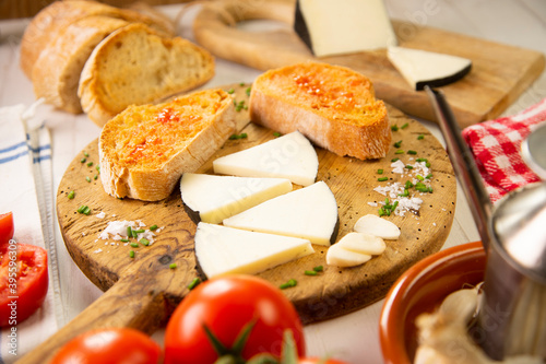 Manchego cheese, served with traditional 'P� amb tomaquet' photo