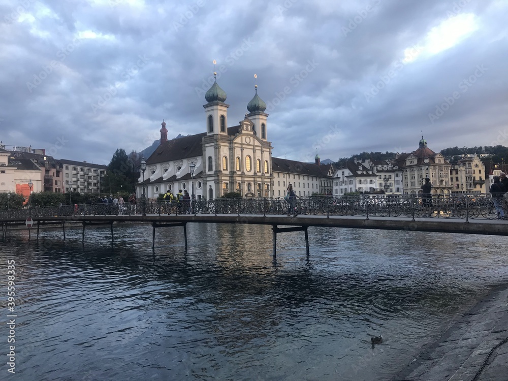 view of Jesuit Church near the river Reuss in the old town of Lucerne, Switzerland