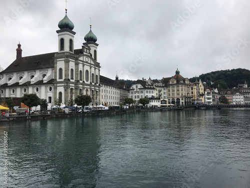 view of Jesuit Church near the river Reuss in the old town of Lucerne, Switzerland © April Wong