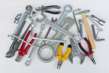 A heap of various hand locksmith tools.