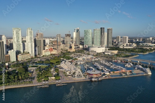 Miami  Florida - November 26  2020 - Aerial view of Bayside Marketplace  City of Miami Marina and Miami skyline on sunny autumn morning.