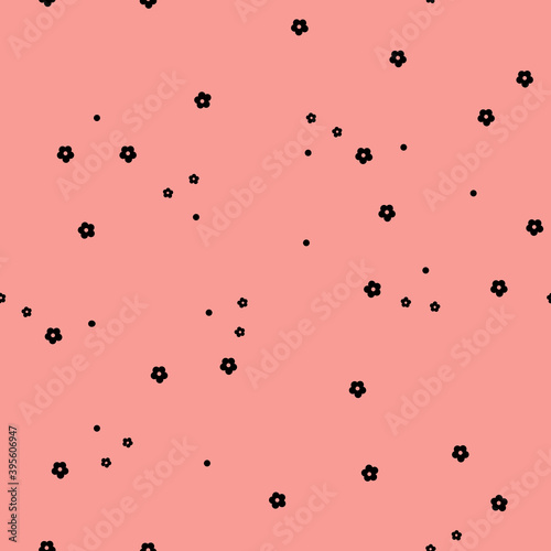 Simple vintage pattern of flowers. Pink  background, small black flowers and dots. The print is well suited for textiles,banners and postcards.
