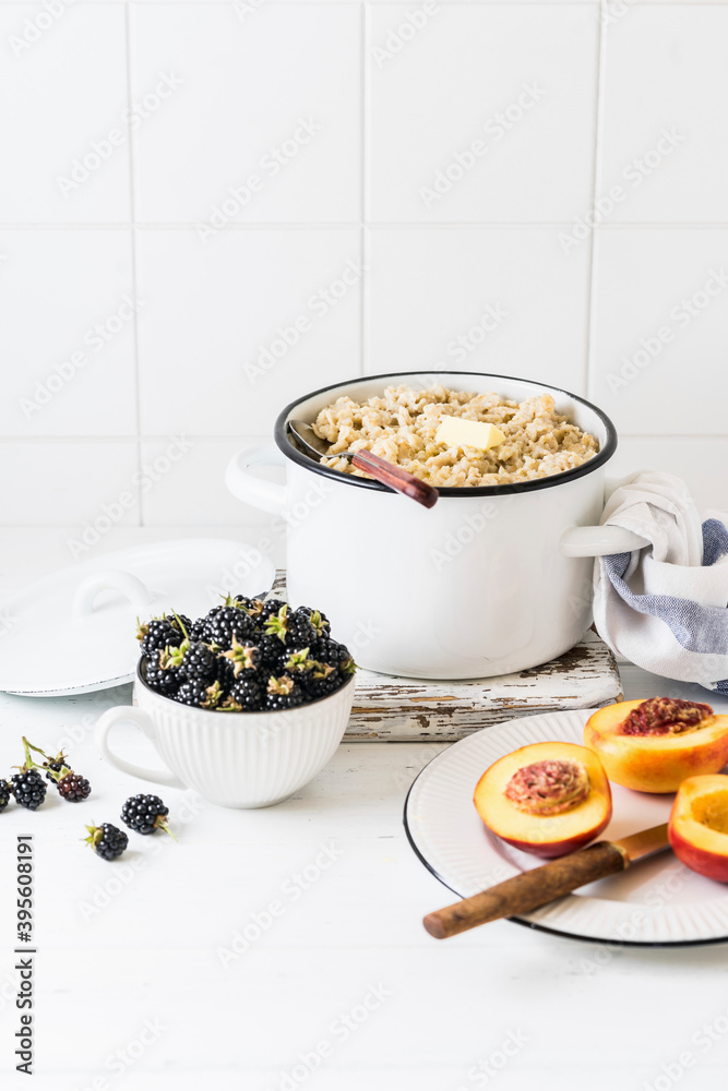 Oat porridge with butter and fresh blackberries Oat porridge with butter and fresh blackberries