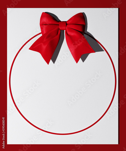 Red bow on paper, holidays card