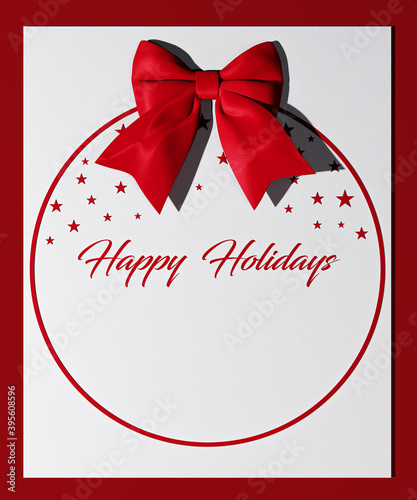 Red bow on paper, holidays card