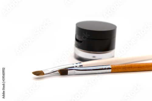 Brushes and shadows for professional correction and coloring of eyebrows on a white background