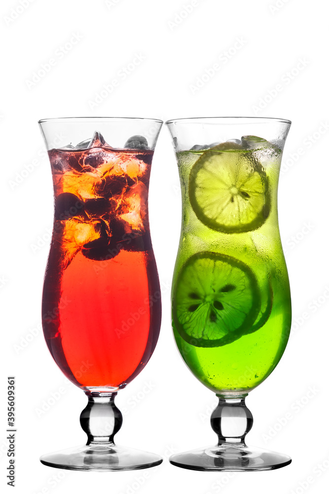 Green and red cocktail with lemon and ice on a white isolated background Green and red cocktail with lemon and ice on a white isolated background