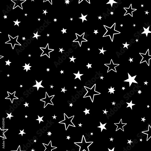 image of white festive stars on black background