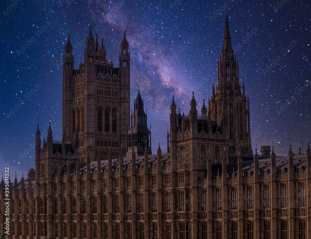 London, England, the British parliament's impressive building under the starry night sky.