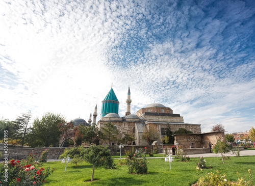 Tomb of Mevlana, the founder of Mevlevi sufi dervish order, with prominent green tower in Konya, Turkey photo