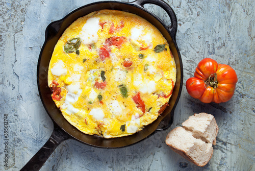 Oven baked tomato and cheese omelette