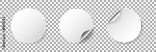 Round empty stickers with rolled corner and shadow. Realistic blank white promotional labels with curled edge. Adhesive circle price tag mockup. Vector illustration
