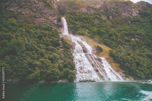 The Bridegroom waterfall. Friaren, Skageflafossen, Geitfossen, Geirangerfjord, Norway photo