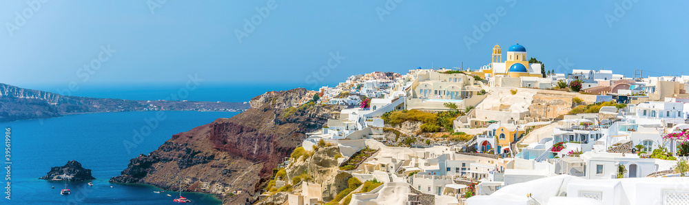 A panorama view of the Castle and town of Oia on the edge of the Caldera in Santorini in summertime