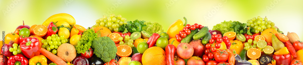 Wide pattern of ripe fruits and vegetables on green background. Wide pattern of ripe fruits and vegetables on green background.
