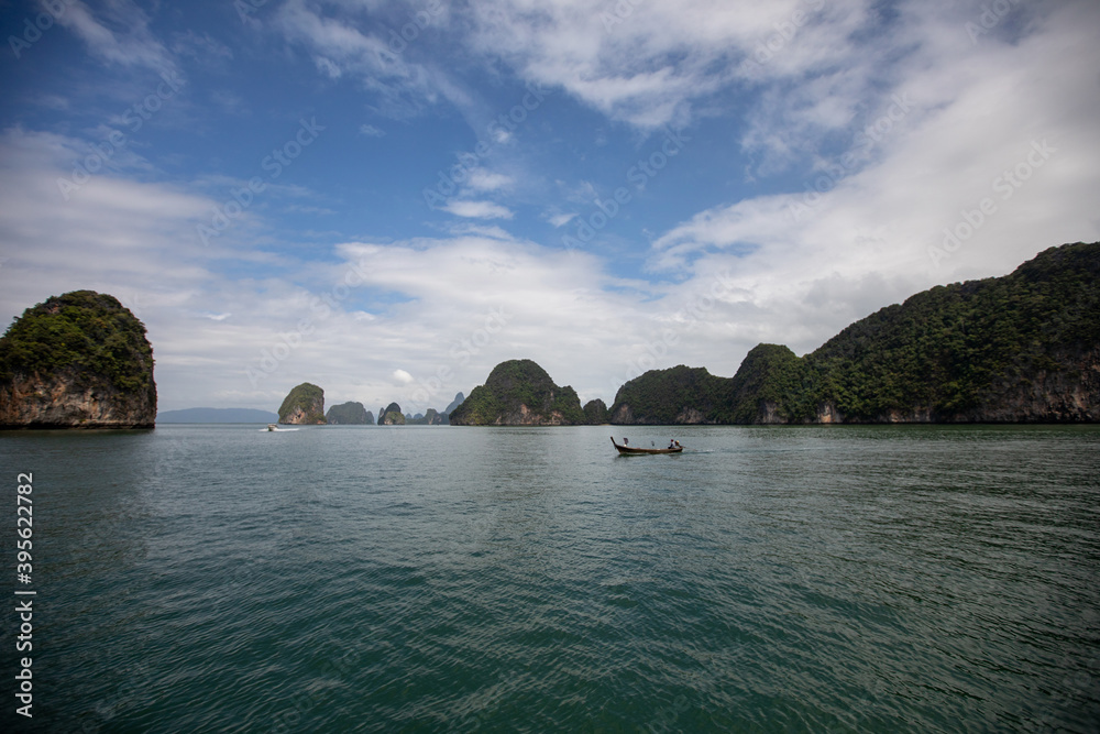 Obraz premium Landscape of Phi Phi island scenic beautiful place in sunny day, Traveling with wooden boat adventure famous nature sea beach Krabi, Travel Phuket Thailand, Summer holidays vacation trip, Tourism Asia