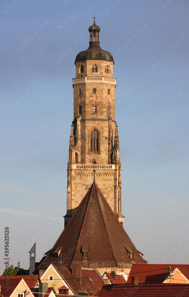 Symmetrical view of the gothic St Georg church tower in the old town of Nördlingen, Bavaria in Germany