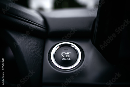 Close up Engine start stop button from a modern car interior © onphotoua