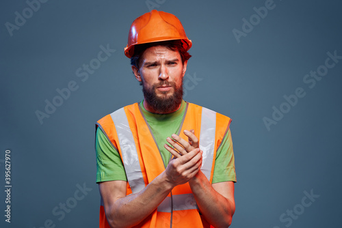 Man in working uniform to professionals construction lifestyle blue background