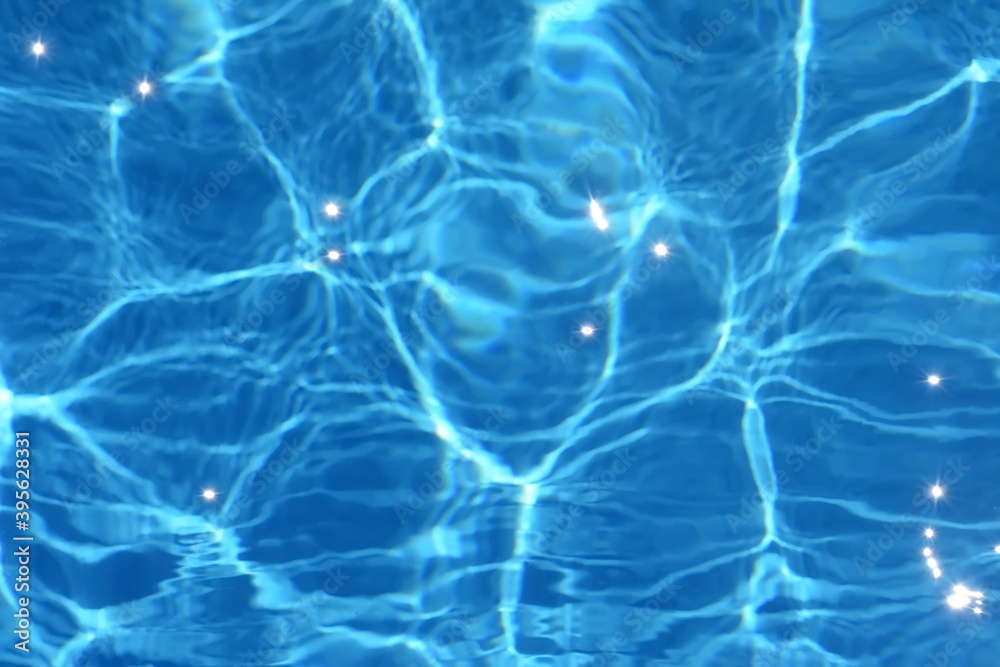 Surface of blue swimming pool,background of water in swimming pool. Water background blue. Surface of blue swimming pool,background of water in swimming pool. Water background blue.