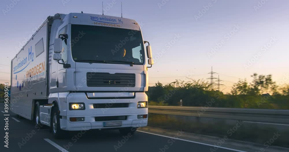hydrogen fueled truck on the road drinving. h2 combustion Truck engine for emission free ecofriendly transport.