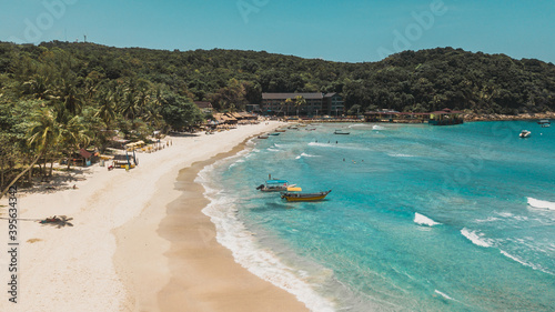 Aerial view of Long Beach at Perhentian Islands, Malaysia. Turquoise blue water beach. Drone shot. © Rafael