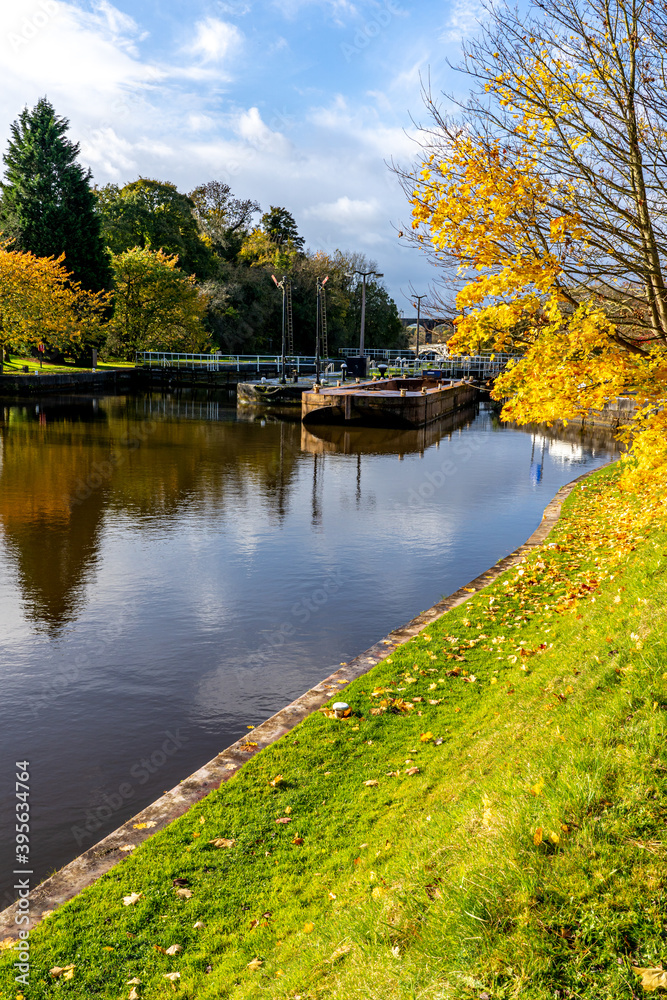 Ditton Locks on the River Weaver Near Northwich Cheshire UK. Autumn colours and leaves.