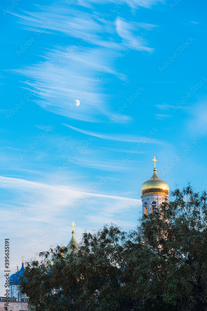 Orthodox church domes against blue sky in Ukraine, Odessa