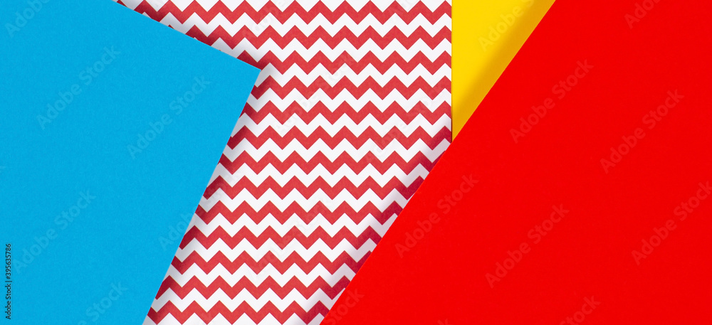 Abstract geometric fashion papers texture background in yellow, red, pink, blue colors. Top view, flat lay Abstract geometric fashion papers texture background in yellow, red, pink, blue colors. Top view, flat lay