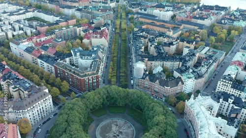 Aerial drone shot flying over the city of Stockholm. Karlplan plaza & fountain. photo