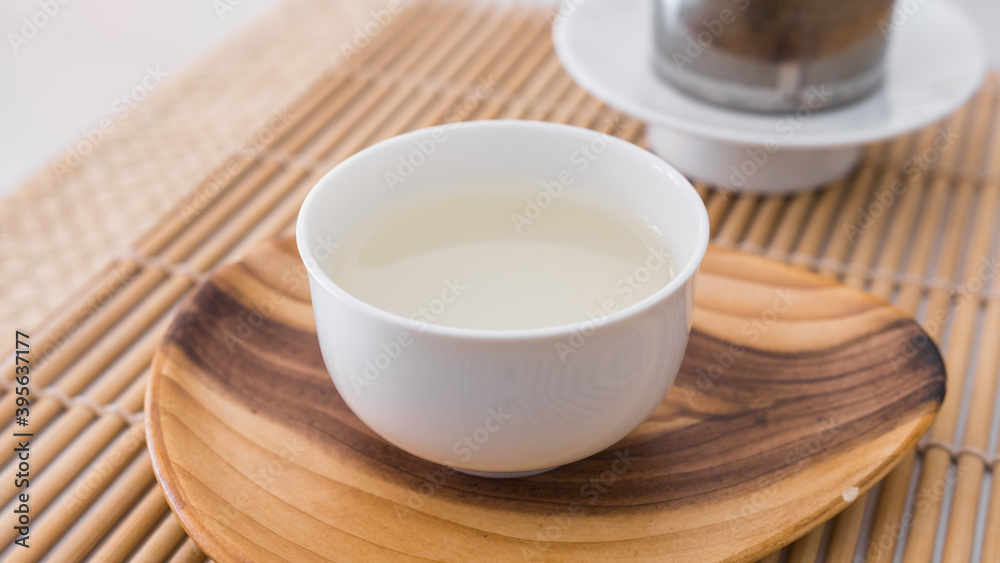 Beautiful porcelain tea cup on a saucer.
Huang Shan Mao Feng green tea from Anhui province, China. Very hydrating and energising beverage. Spring harvest. Close up shot. Beautiful porcelain tea cup on a saucer.
Huang Shan Mao Feng green tea from Anhui province, China. Very hydrating and energising beverage. Spring harvest. Close up shot.