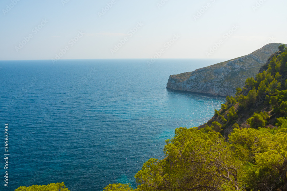 Fototapeta premium Beautiful mediterranean coast with cliff and forest. Paradise view.