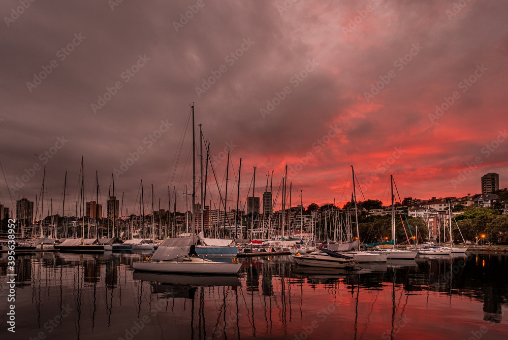 yachts in the marina at a red dawn