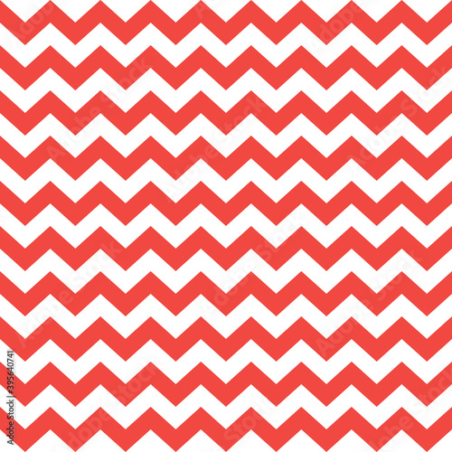 Zig zag Christmas and new year pattern. Regular chevron stripes of red and white color. Classic zigzag lines abstract geometry background. Seamless texture print. Vector illustration