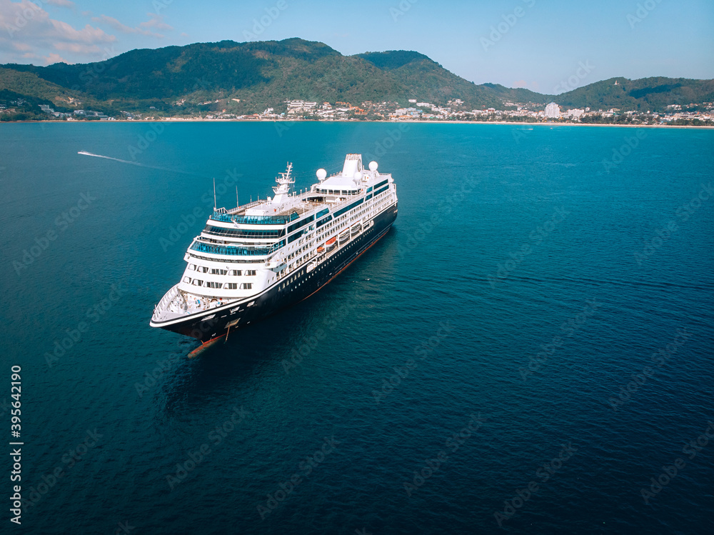 Obraz premium Large Cruise ship sailing across The Andaman sea - Aerial image. Beautiful sea landscape