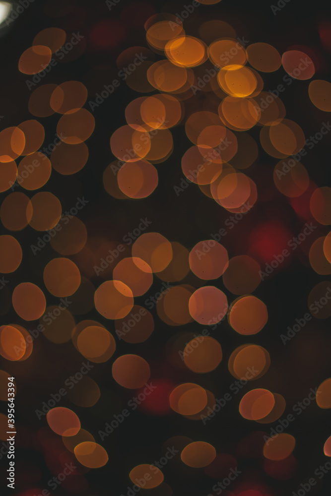 dark golden lights bokeh effect Christmas background wallpaper poster concept in vertical picture format dark golden lights bokeh effect Christmas background wallpaper poster concept in vertical picture format