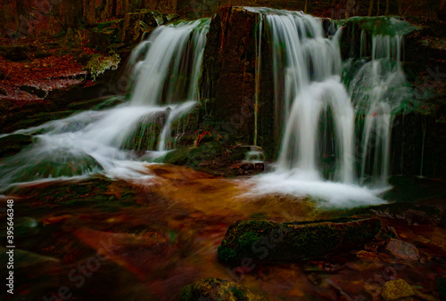 Wild brook with stones and waterfall in Jeseniky mountains  Eastern Europe  Moravia. Clean fresh cold watter  water stream. Long exposure image. .