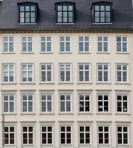 Copenhagen, Denmark: facade of a vintage white building at Holmens Kanal photo