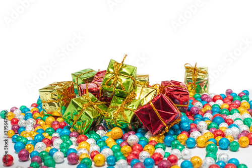 Colorful gifts box and balls isolated on white background
