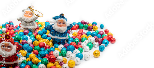 Santa Claus and Colorful balls on white background. © avs