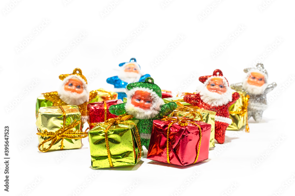 Santa Claus with gift box isolated on a white background.