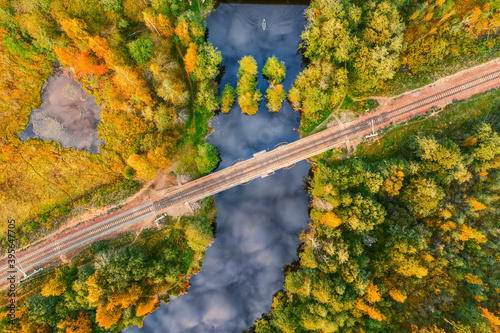 Forest river with sky refle...