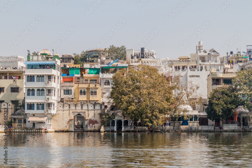 Historical buildings by Pichola lake in Udaipur, Rajasthan state, India