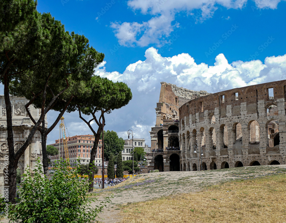 Colosseum ruin in Rome with cloudy sky