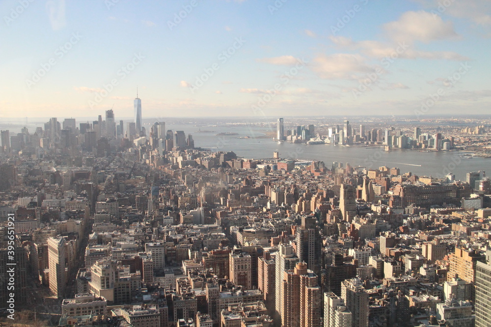 New York Harbor and its skyscrapers from 86th floor of Empire State Building.