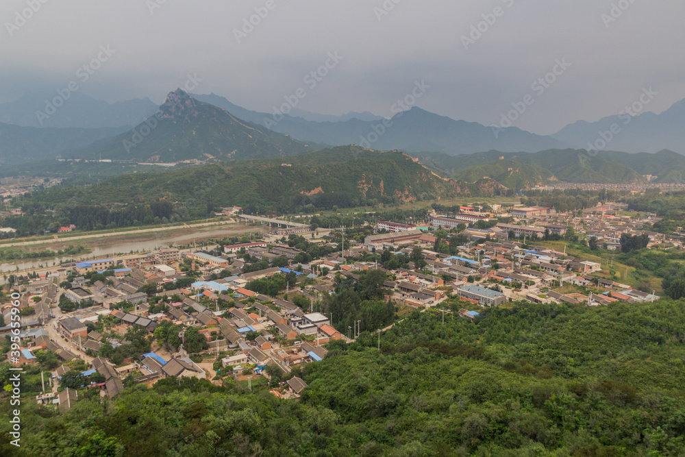 Gubeikou village and the section of the Great Wall of China.