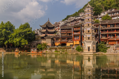 Riverside buildings and Wanming Pagoda in Fenghuang Ancient Town, Hunan province, China